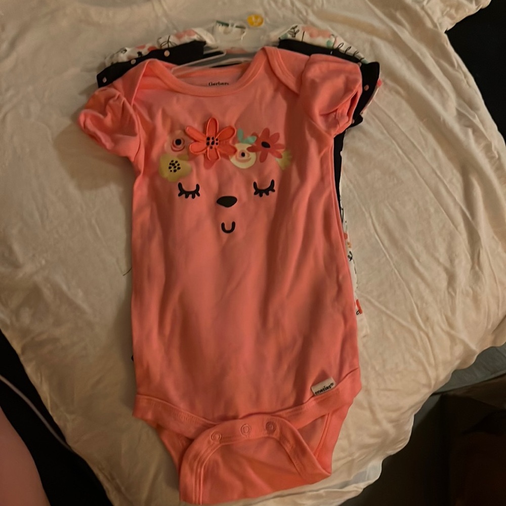 NWT onesies, back of 3